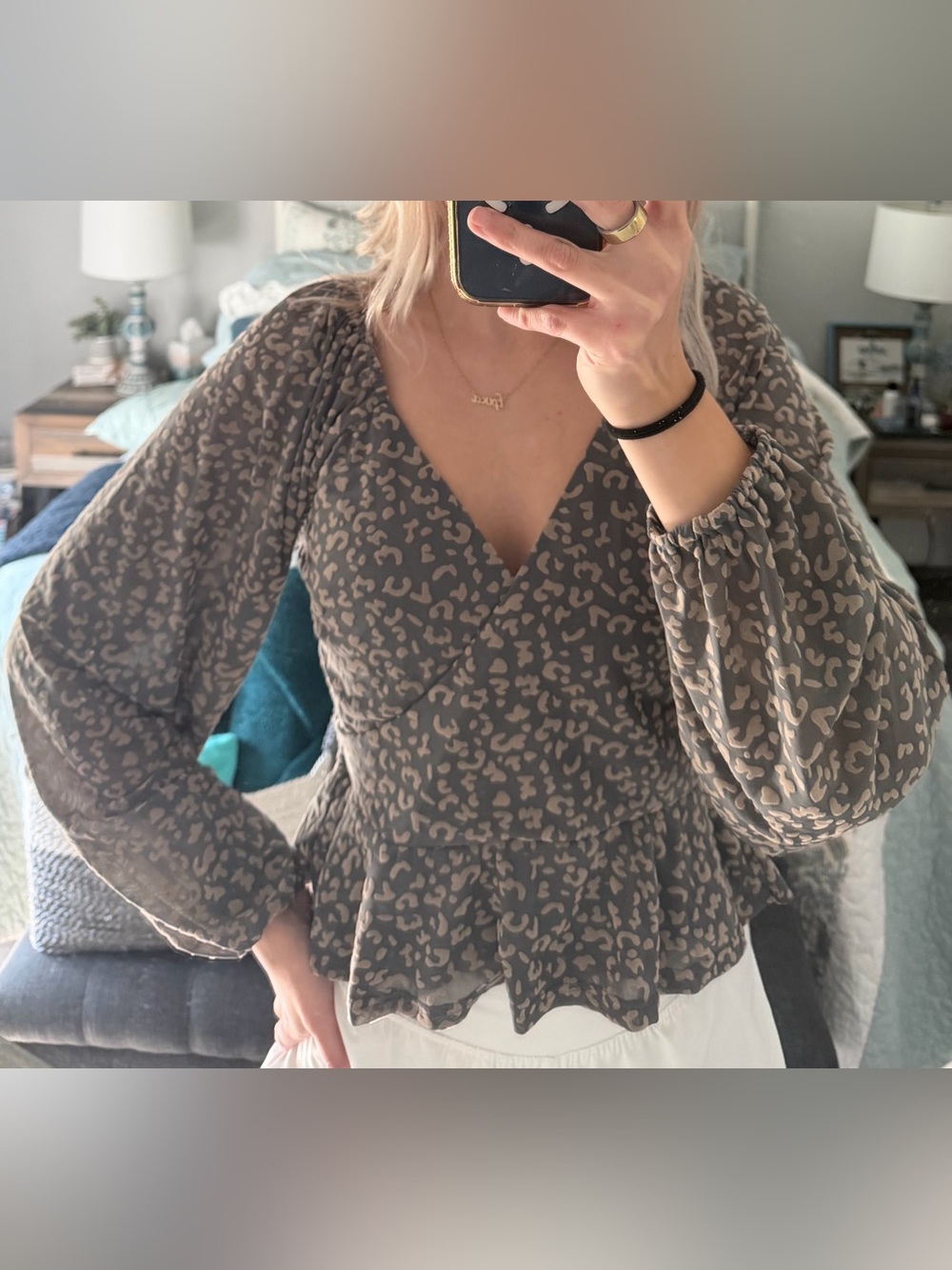 Vestique cheetah print blouse